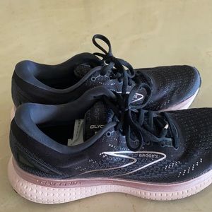 Brooks sneakers. Like new worn once. Black with light pink sole. Original $135.